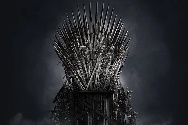 Il leggendario trono di spade, simbolo di potere e intrighi nella famosa serie fantasy. Un'immagine potente che evoca mistero e dominazione.