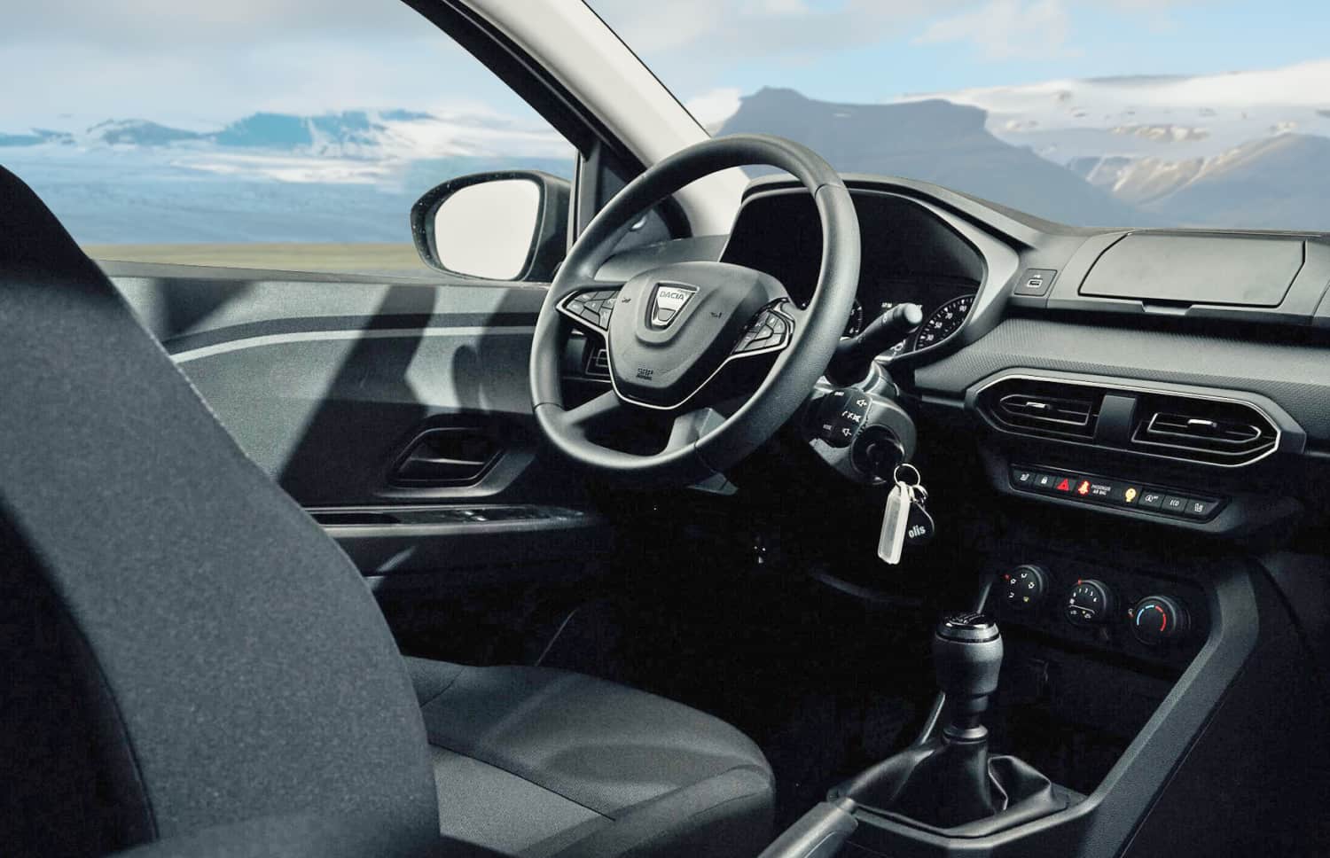 Dacia Jogger nera con cambio manuale, 7 posti, GPS, USB e sedili riscaldati; auto spaziosa per viaggi di gruppo o familiari in Islanda.